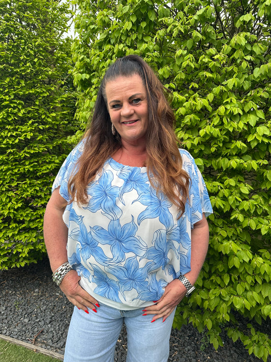 VLEERMUIS KORTE MOUW PRINT BLOEM LICHT BLAUW